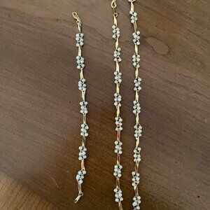 Vintage faux pearl and gold-tone swirl necklace and bracelet